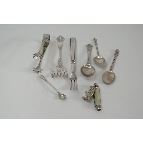 382 - Vintage spoons, sugar tongs, penknife, embassy plate, pickle fork etc