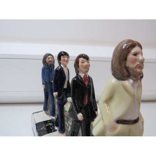 175 - Beatles Abbey Road figures.