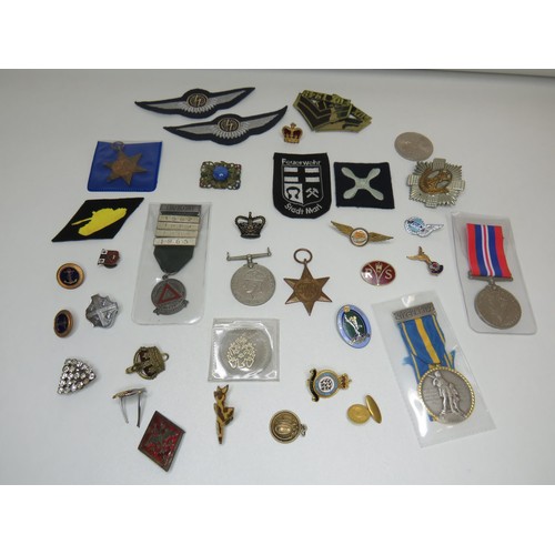 132 - Various medals, badges, coins.