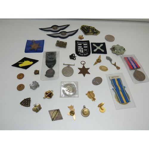 132 - Various medals, badges, coins.