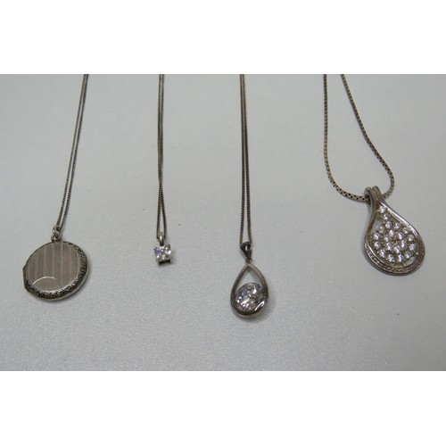 233 - Four silver necklaces.