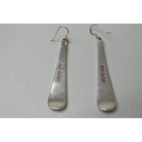 254 - Pair of silver earrings.