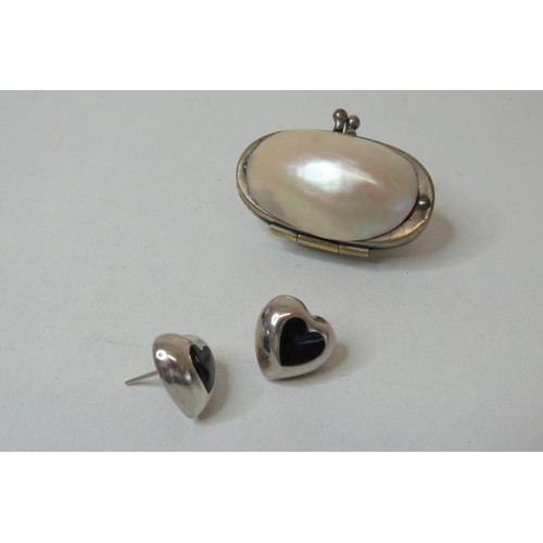 256 - Shell case and pair of silver earrings.