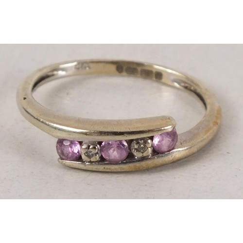 227 - White gold eternity ring with pink stones and diamond - marked 375