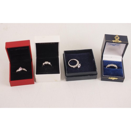 228 - Four boxed silver rings