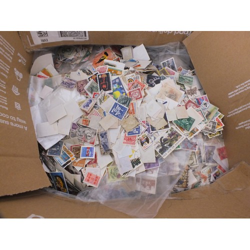 393 - Two large boxes of various stamps - over a thousand