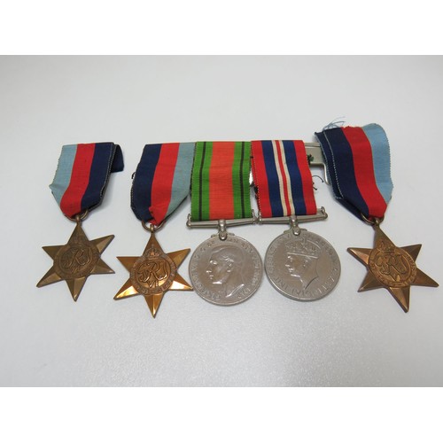 444 - Five WWII medals including mounted set