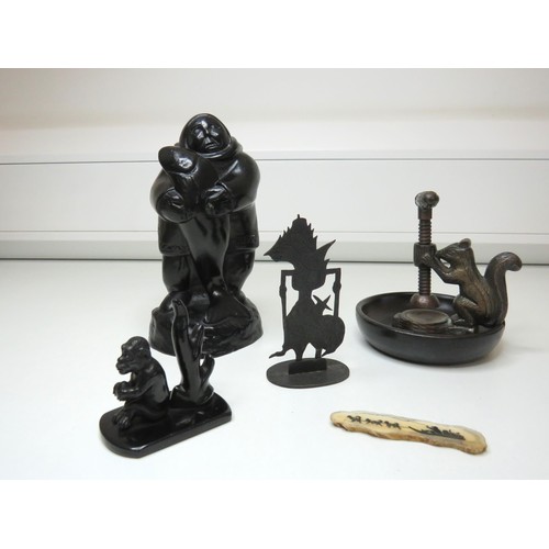 448 - Mixed lot of collectables to include brass and treen squirrel nut cracker, carved wooden eskimo and ... 