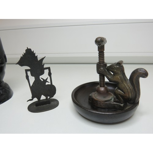 448 - Mixed lot of collectables to include brass and treen squirrel nut cracker, carved wooden eskimo and ... 