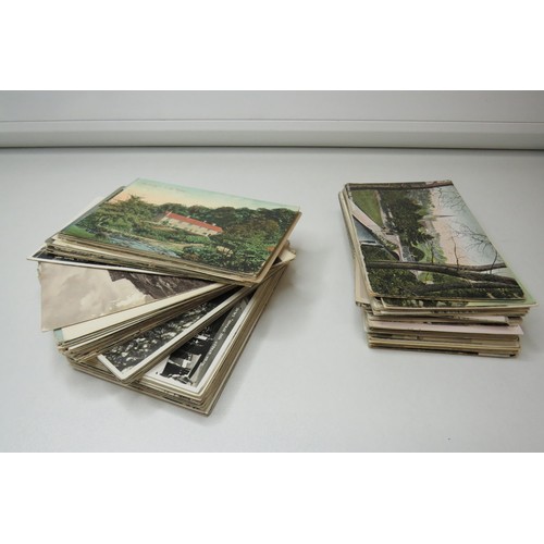 121 - Two hundred old UK postcards.