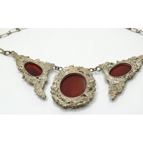 65 - Silver tone and Carnelian statement necklace.