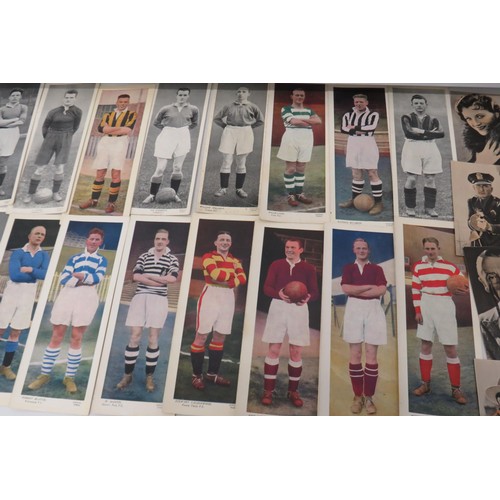 71 - Twenty seven Topical Times Footballer cards and postcards.