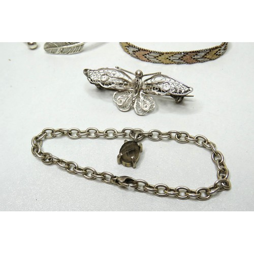 76 - Silver Jewellery includes bracelets, large gemstone pendant, Amber necklace etc.
Total weight 69g