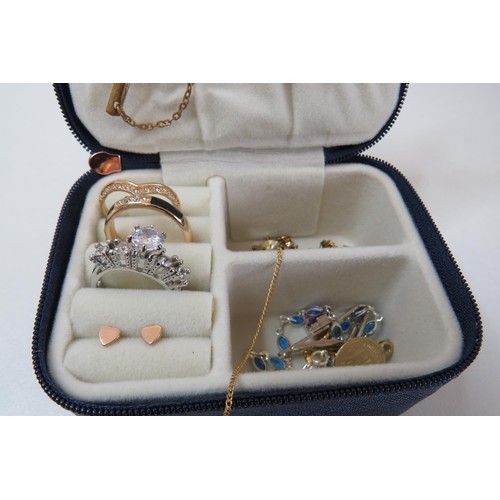 215 - Blue case and contents includes gold/silver tone jewellery.