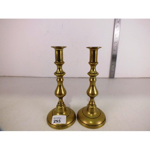 285 - A pair of vintage heavy brass large candlesticks.