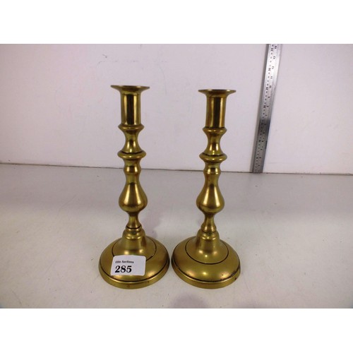 285 - A pair of vintage heavy brass large candlesticks.