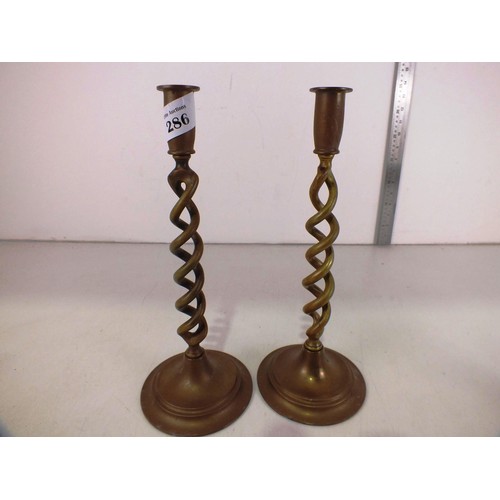 286 - A pair of vintage brass barley twist candlesticks.