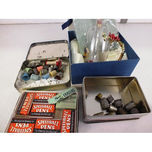 294 - Two vintage tins of thimbles and a boxed Amabeta glass cup with spoon.