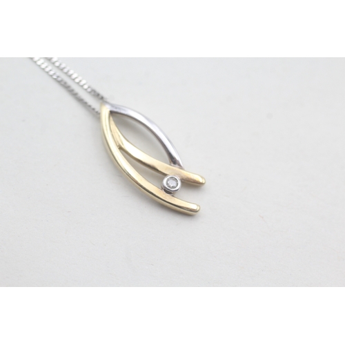 468 - 9ct gold and diamond pendant on chain (1.8g)