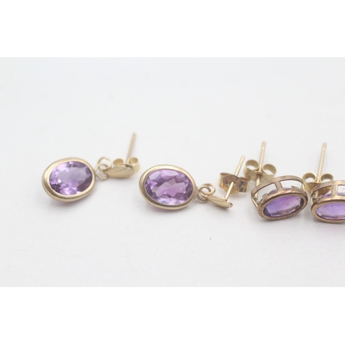 499 - Two pairs of 9ct gold amethyst drop earrings (1.6g)