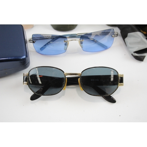 513 - Eight pairs of Designer Sunglasses Assorted Including Cases, Dust Cloths