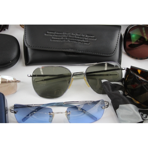 513 - Eight pairs of Designer Sunglasses Assorted Including Cases, Dust Cloths