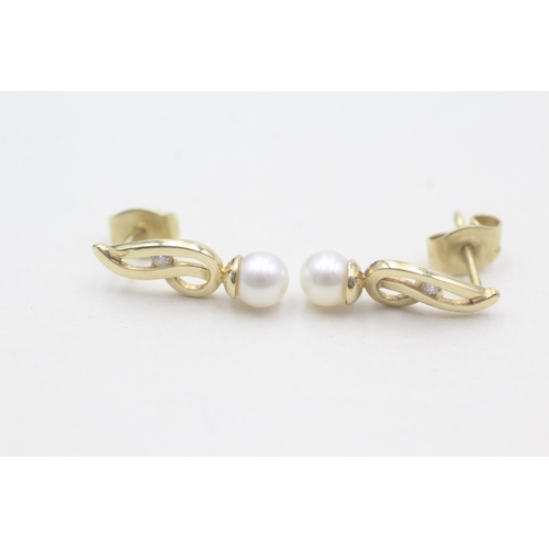 520 - 9ct gold cultured pearl stud earrings (1.3g)