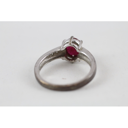 540 - 9ct white gold glass filled ruby solitaire dress ring with diamond set shoulders (3.6g) size N.