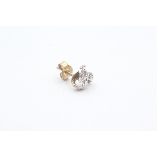 549 - 9ct gold and diamond stud earrings (1.6g)