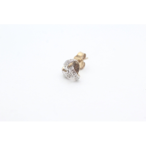 549 - 9ct gold and diamond stud earrings (1.6g)