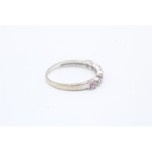 584 - 9ct gold pink sapphire & diamond half eternity ring (1.2g) size L.