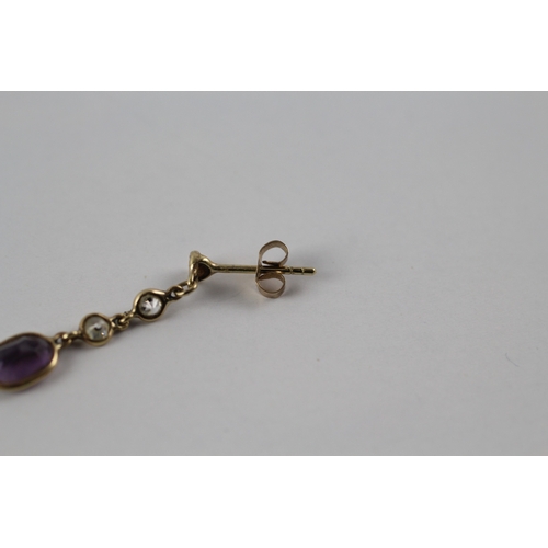 599 - 9ct gold amethyst and clear gemstone drop earrings (1.1g)