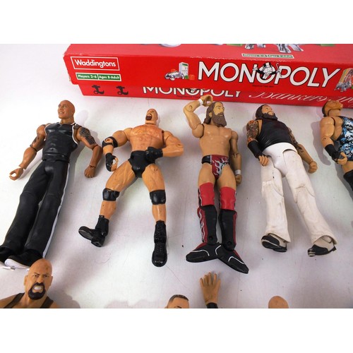 305 - Monopoly board game and assortment of wrestling figures