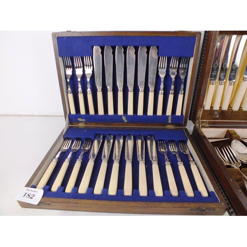 182 - Two wood cased canteens of cutlery includes viners