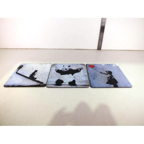 211 - Three Banksy placemats