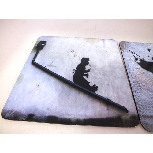 211 - Three Banksy placemats