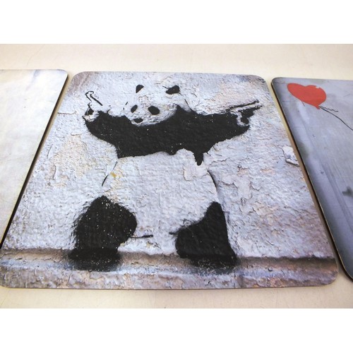 211 - Three Banksy placemats