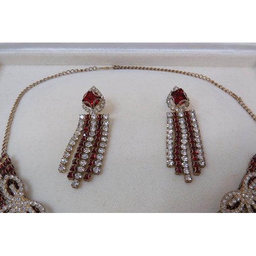 255 - Stunning boxed red and white CZ necklace and earrings set.