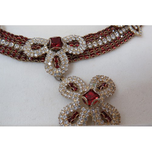 255 - Stunning boxed red and white CZ necklace and earrings set.