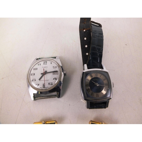 233 - Two manual wind watches Timex and sekonda and ments mother of pearl cufflinks