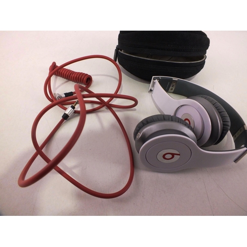 11 - Genuine beats headphones in working order (untested)