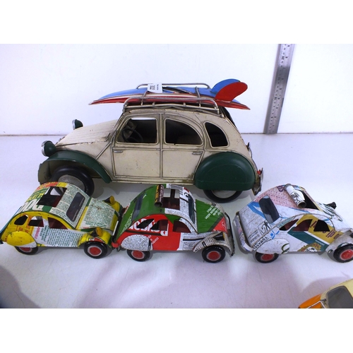 322 - Large tin plate vintage car and three other tinplate cars- all Citroen and others