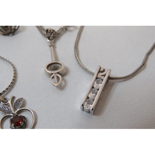 44 - Three silver necklace's with gemstone pendants, silver stud earrings and 925 silver cz ring.