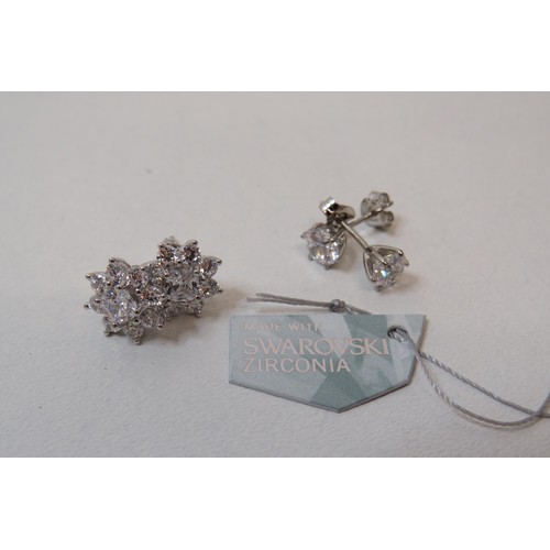 46 - Four pairs of 925 silver earrings including two pairs of Swarovski.