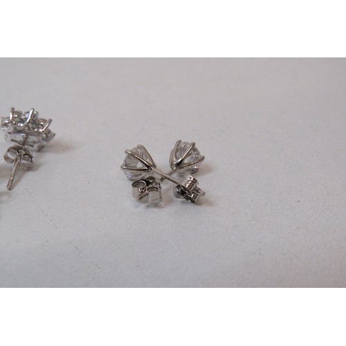 46 - Four pairs of 925 silver earrings including two pairs of Swarovski.