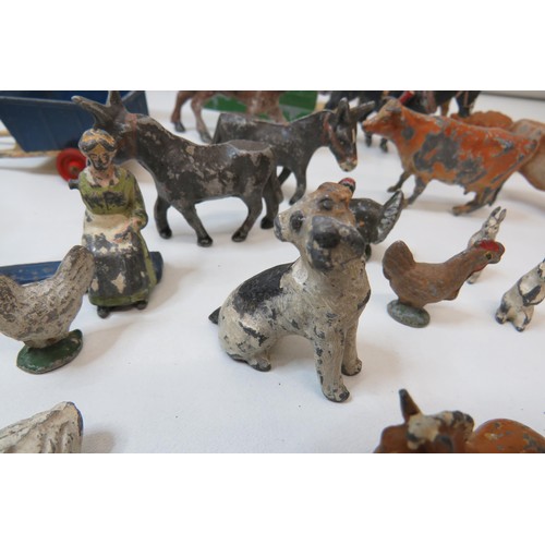 261 - Vintage toys to include Britains Farm and Zoo animals, figures, trailers and Corgi pony trailer.