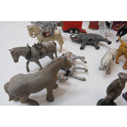 261 - Vintage toys to include Britains Farm and Zoo animals, figures, trailers and Corgi pony trailer.