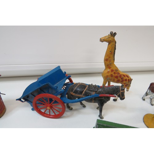 261 - Vintage toys to include Britains Farm and Zoo animals, figures, trailers and Corgi pony trailer.