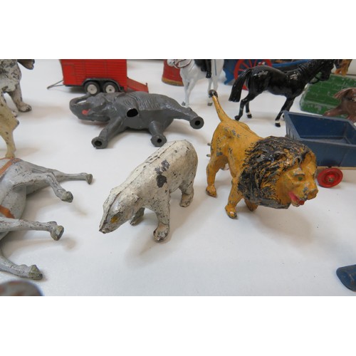 261 - Vintage toys to include Britains Farm and Zoo animals, figures, trailers and Corgi pony trailer.