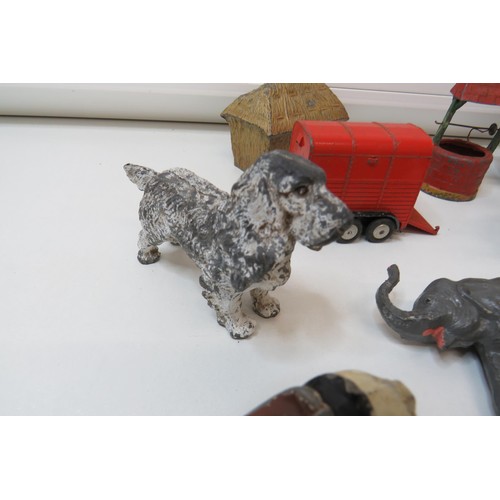 261 - Vintage toys to include Britains Farm and Zoo animals, figures, trailers and Corgi pony trailer.